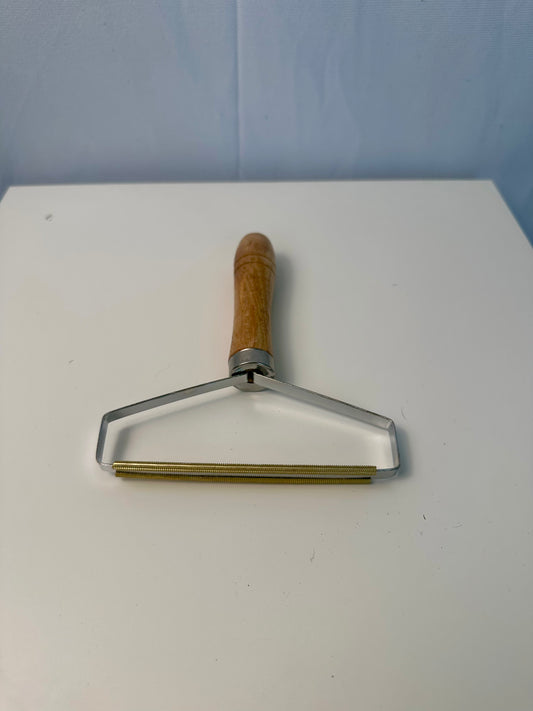 Grattoir pour enlever le poil